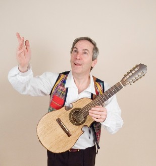 Richard Stillman Holding Small Guitar